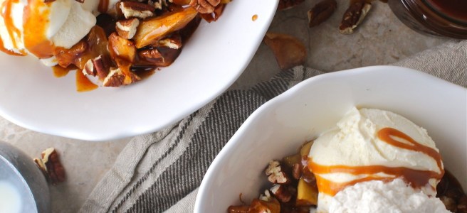 These Caramel Baked Apple Ice Cream Sundaes are loaded with brown sugar and cinnamon baked apples and homemade salted caramel sauce! | The Millennial Cook #fallrecipe #icecream #sundae #apple #caramel