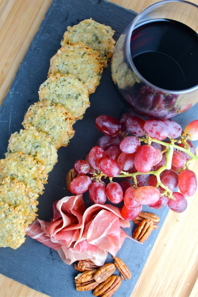 These rich, flaky, and extra cheesy Cheddar Herb Crackers are the perfect snack to pair with red wine! | The Millennial Cook #appetizer #cheeseplate #crackers #cheddar