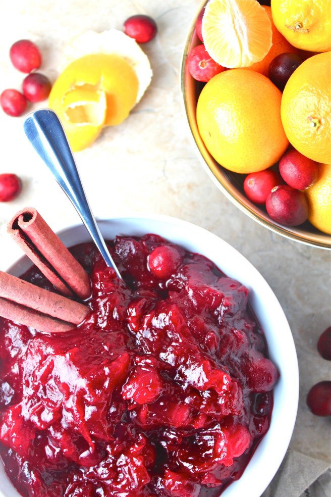 This simple Cranberry Sauce, flavored with fresh tangerines and cinnamon, is the perfect sweet addition to Thanksgiving dinner! | The Millennial Cook #fallrecipe #thanksgiving #cranberrysauce