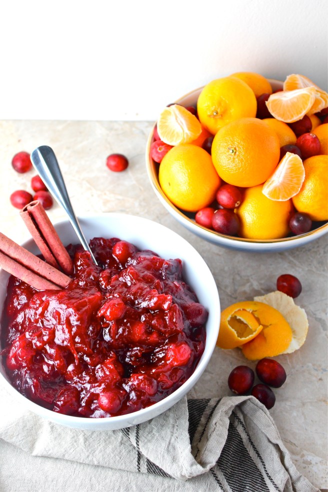 This simple Cranberry Sauce, flavored with fresh tangerines and cinnamon, is the perfect sweet addition to Thanksgiving dinner! | The Millennial Cook #fallrecipe #thanksgiving #cranberrysauce