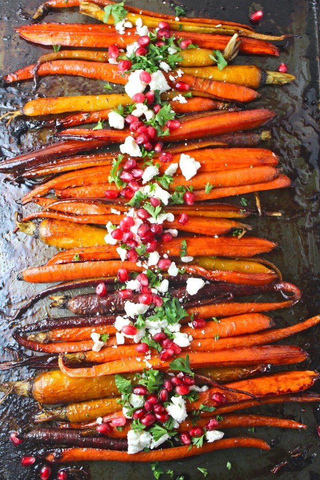 These perfectly caramelized Roasted Pomegranate Carrots are dressed up with pomegranate molasses! | The Millennial Cook #sidedish #vegetables #carrots #roastedcarrots #pomegranate