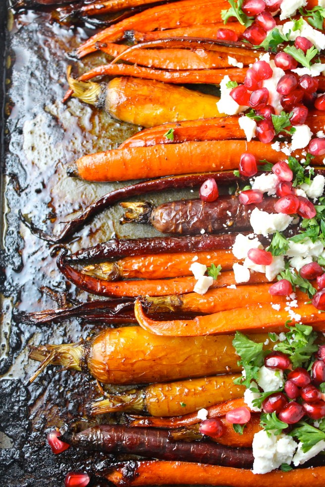 These perfectly caramelized Roasted Pomegranate Carrots are dressed up with pomegranate molasses! | The Millennial Cook #sidedish #vegetables #carrots #roastedcarrots #pomegranate