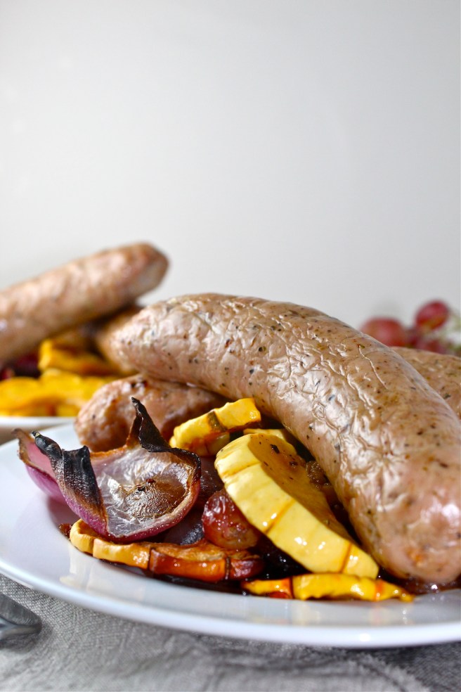 These Roasted Sausages with Squash & Red Grapes are an easy-to-throw-together one pan dinner! | The Millennial Cook #fallrecipe #dinner #easydinner #onepandinner