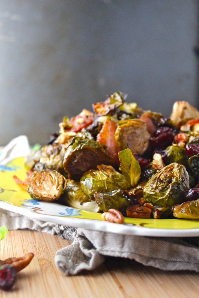 These Sweet & Tart Caramelized Brussels Sprouts are loaded with tart balsamic vinegar, sweet maple syrup, and plenty of bacon for the most delicious and decadent side dish! | The Millennial Cook #fallrecipe #brusselssprouts #bacon #maple