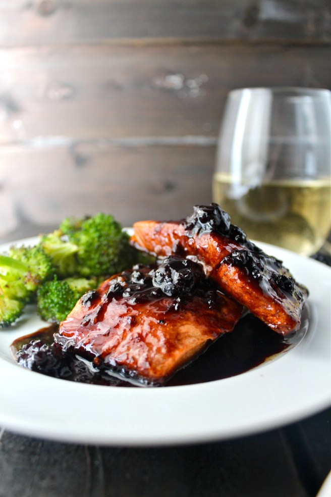 This Berry Glazed Salmon features a sweet sauce made with blackberry jam and white wine - my favorite way to prepare my favorite fish! | The Millennial Cook #salmon #blackberry
