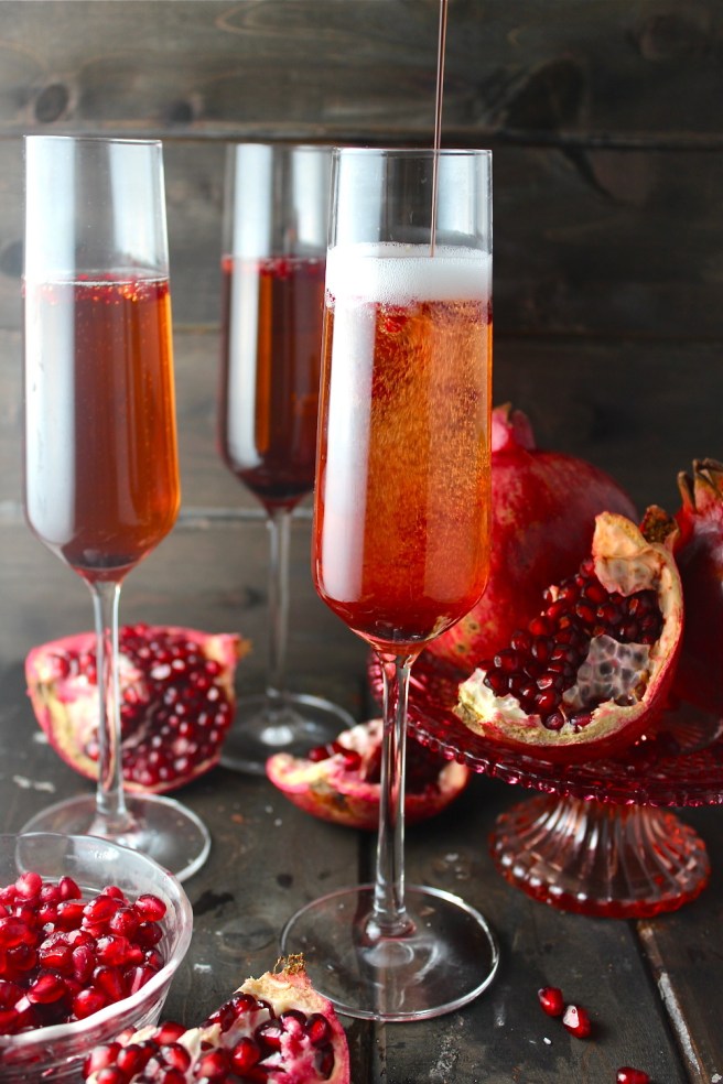 This Pomegranate Champagne Sparkler is the perfect sweet, tart, and bubbly celebration cocktail! | The Millennial Cook #champagne #cocktail #pomegranate