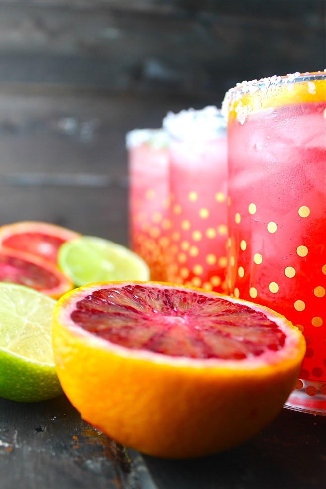 These Blood Orange Margaritas are tart, sweet, and refreshing - the perfect vibrant antidote to the winter gloom! | The Millennial Cook #winterrecipe #drink #margarita #bloodorange #lime