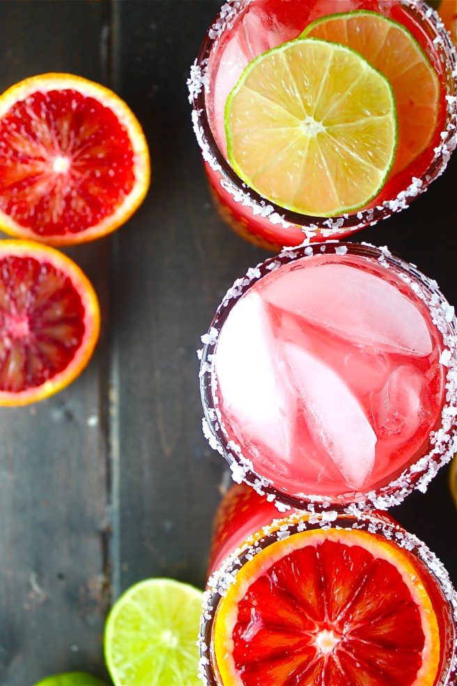 These Blood Orange Margaritas are tart, sweet, and refreshing - the perfect vibrant antidote to the winter gloom! | The Millennial Cook #winterrecipe #drink #margarita #bloodorange #lime