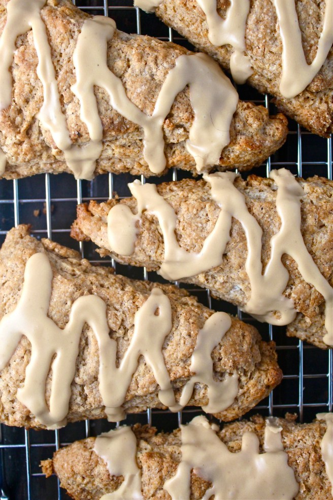 These Chai Spiced Scones are laden with all of my favorite fragrant spices, and topped with a sweet chai glaze! | The Millennial Cook #winterrecipe #breakfast #brunch #scones #chai