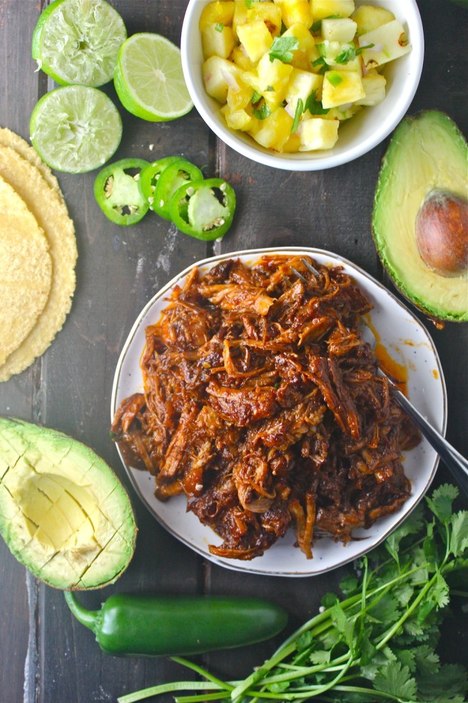 This Pineapple Pulled Pork is flavored with barbecue sauce and diced pineapple - so hearty and delicious! | The Millennial Cook #pork #pulledpork #pineapple #tacos