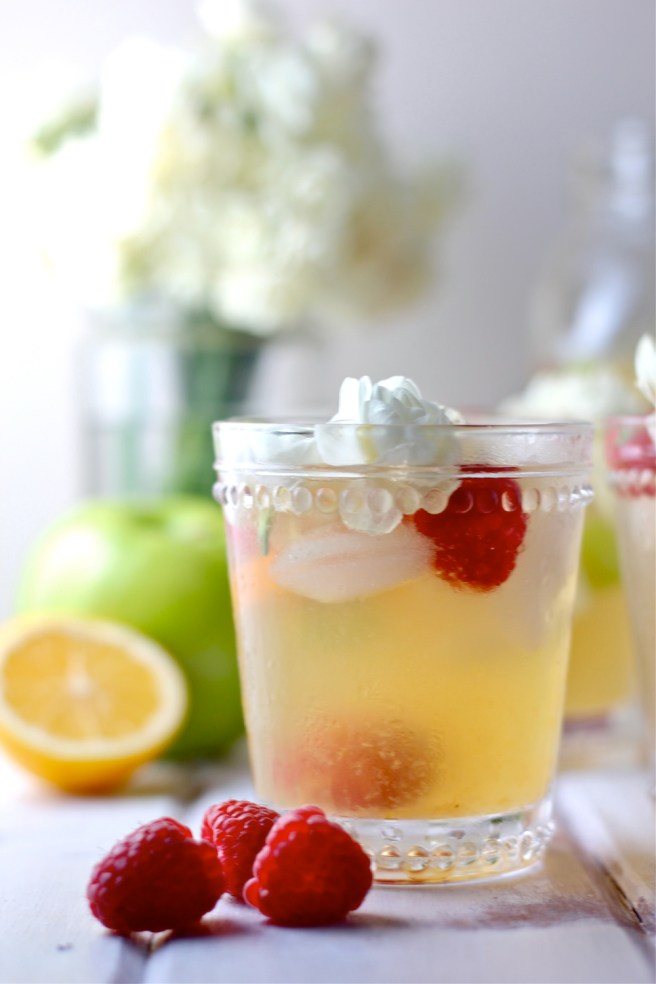 This White Wine Sangria is light, refreshing, and fruity - so perfect for summer! | The Millennial Cook #drink #cocktail #wine #whitewine #sangria