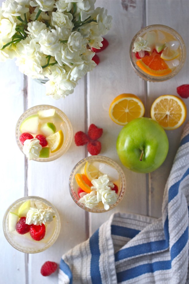This White Wine Sangria is light, refreshing, and fruity - so perfect for summer! | The Millennial Cook #drink #cocktail #wine #whitewine #sangria