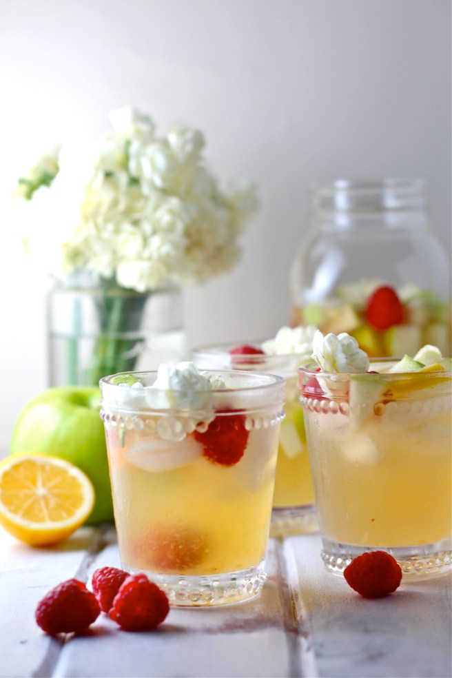 This White Wine Sangria is light, refreshing, and fruity - so perfect for summer! | The Millennial Cook #drink #cocktail #wine #whitewine #sangria
