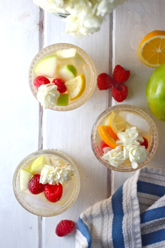This White Wine Sangria is light, refreshing, and fruity - so perfect for summer! | The Millennial Cook #drink #cocktail #wine #whitewine #sangria