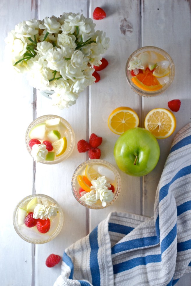 This White Wine Sangria is light, refreshing, and fruity - so perfect for summer! | The Millennial Cook #drink #cocktail #wine #whitewine #sangria