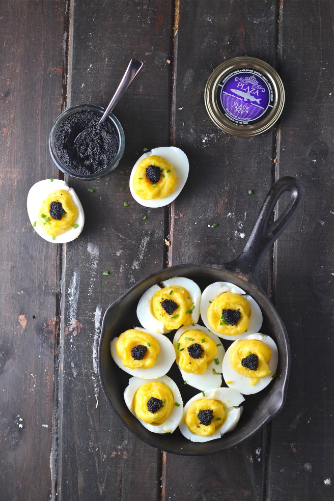 These Fancy Deviled Eggs - with fragrant truffle oil and caviar - are a simple yet decadent treat! | The Millennial Cook #eggs #deviledeggs #truffle #caviar