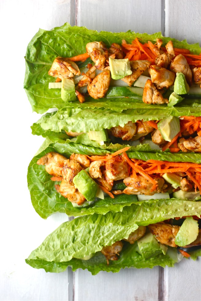 These Thai Chicken Lettuce Wraps - with creamy avocado, bright veggies, and a sweet and tart Asian vinaigrette - are a light and filling dinner! | The Millennial Cook #thai #asian #chicken #avocado #lettucewraps