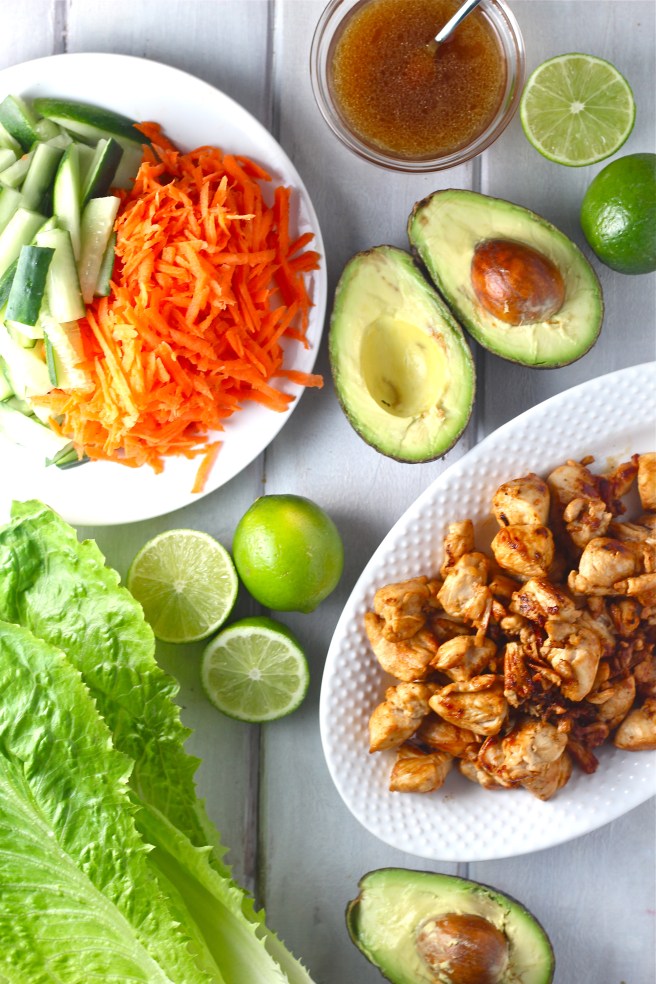 These Thai Chicken Lettuce Wraps - with creamy avocado, bright veggies, and a sweet and tart Asian vinaigrette - are a light and filling dinner! | The Millennial Cook #thai #asian #chicken #avocado #lettucewraps
