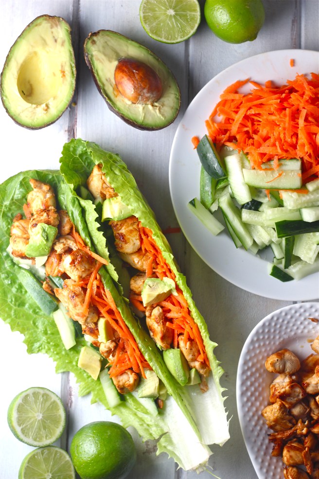 These Thai Chicken Lettuce Wraps - with creamy avocado, bright veggies, and a sweet and tart Asian vinaigrette - are a light and filling dinner! | The Millennial Cook #thai #asian #chicken #avocado #lettucewraps