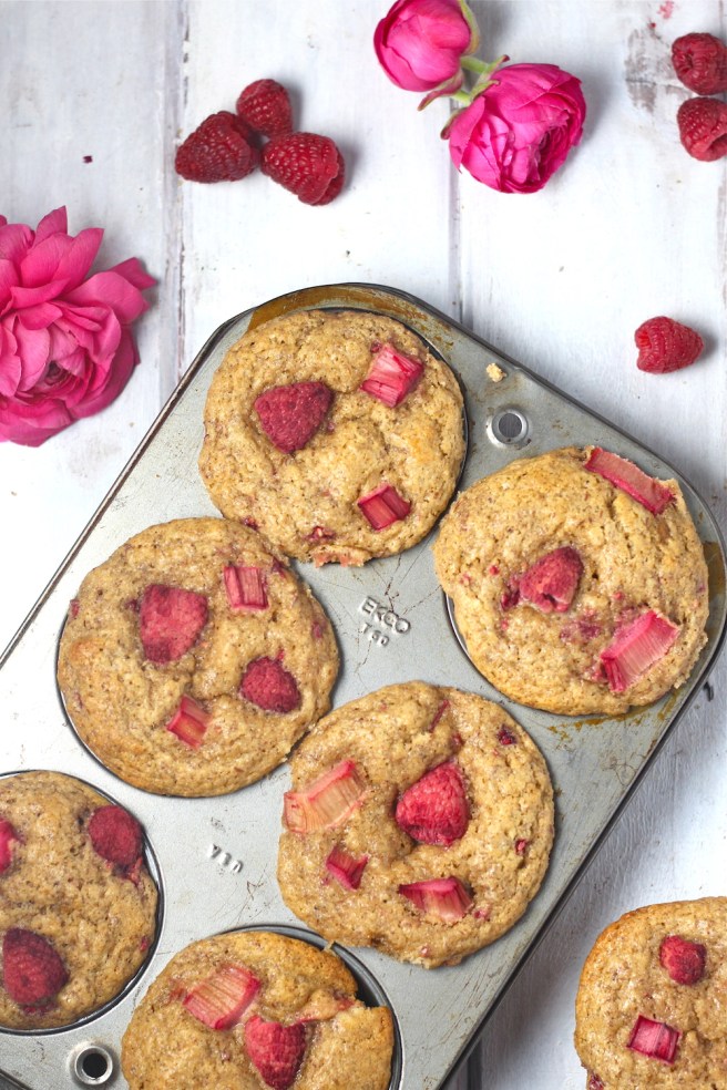 These Raspberry Rhubarb Flax Muffins are loaded with whole wheat flour, ground flaxseed, coconut oil, and maple syrup for the perfect wholesome breakfast! | The Millennial Cook #springrecipe #muffins #strawberry #rhubarb #flax