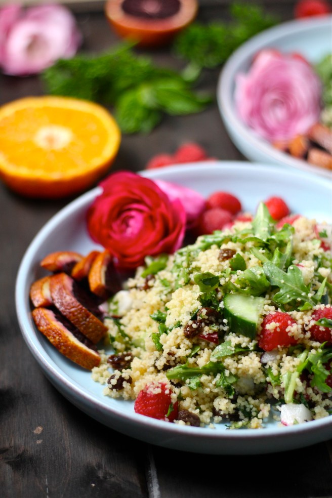 This flavorful Spring Couscous Salad is filled with peppery arugula, fresh raspberries, and crunchy vegetables! | The Millennial Cook #spring #springrecipe #salad #couscous