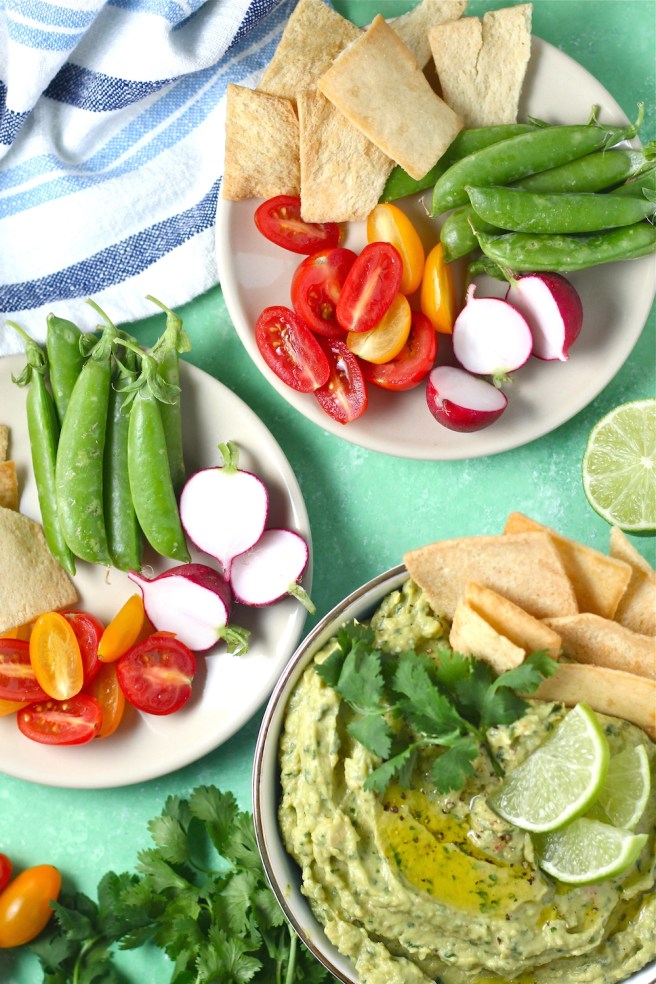 This Avocado Cilantro Hummus is an epic combination of creamy guacamole and classic hummus! | The Millennial Cook #appetizer #snack #hummus #avocado #cilantro #lime