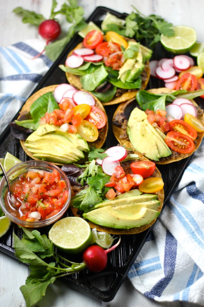 These Vegan Black Bean Tostadas are an easy homemade dinner to satisfy any Mexican craving! | The Millennial Cook #mexican #tostada #avocado #vegetarian #vegan