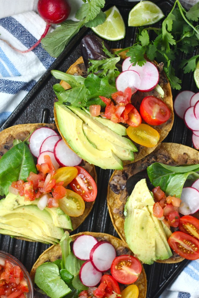 These Vegan Black Bean Tostadas are an easy homemade dinner to satisfy any Mexican craving! | The Millennial Cook #mexican #tostada #avocado #vegetarian #vegan