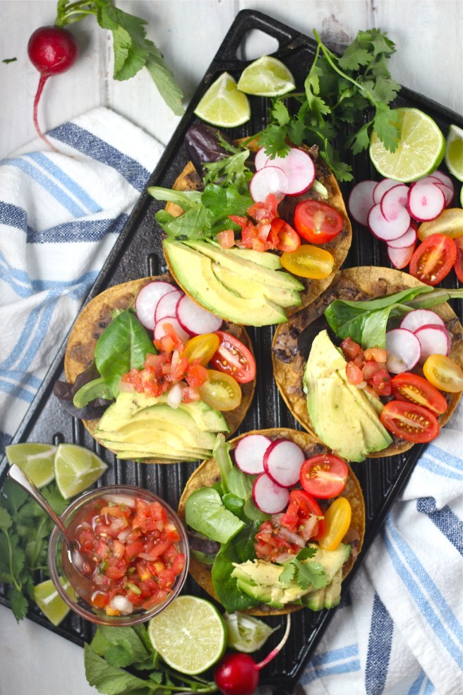 These Vegan Black Bean Tostadas are an easy homemade dinner to satisfy any Mexican craving! | The Millennial Cook #mexican #tostada #avocado #vegetarian #vegan